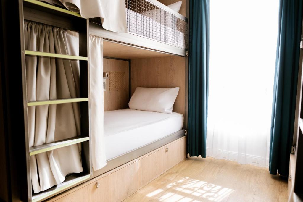 Chambre dortoir du Glint à Paris